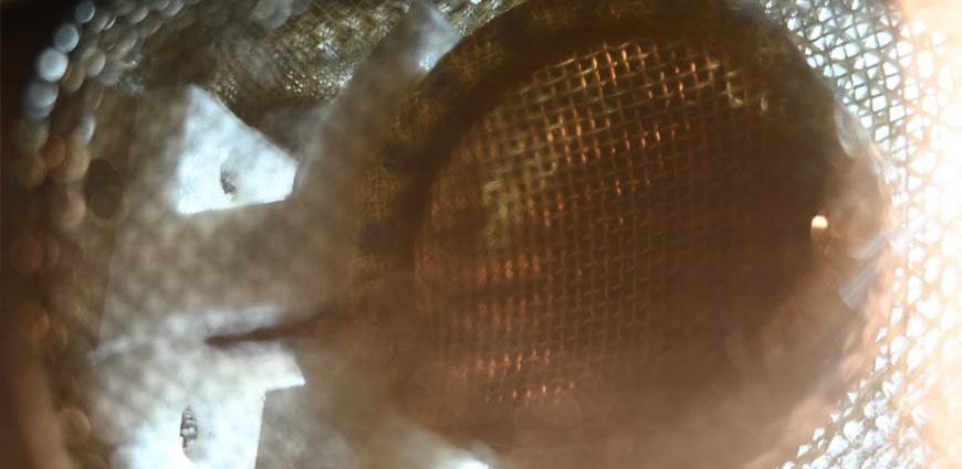 Close-up of a microphone capsule during maintenance
